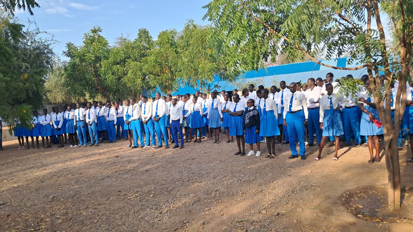 A wide view of students during a school assembly session.