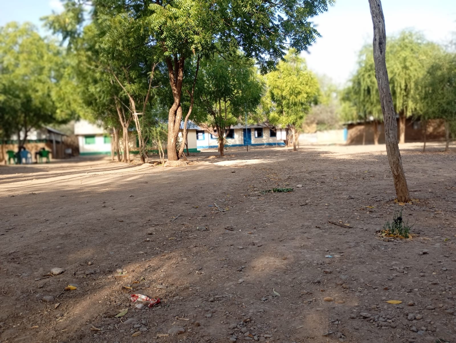 Open school compound used for movement, assemblies and student activities.